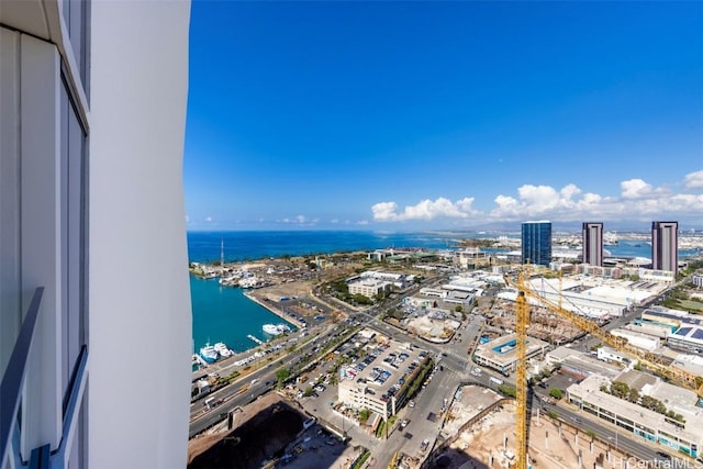 bird's eye view with a view of city and a water view