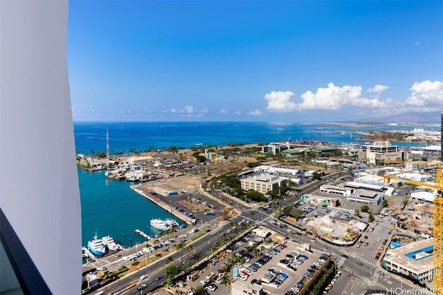 birds eye view of property featuring a water view