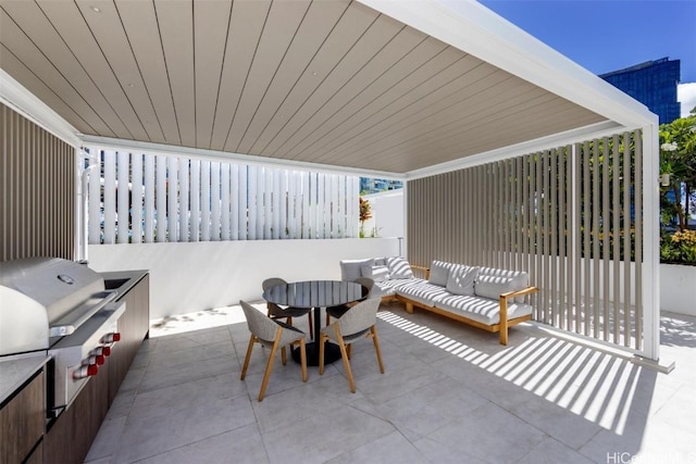 view of patio / terrace featuring a grill and outdoor dining area