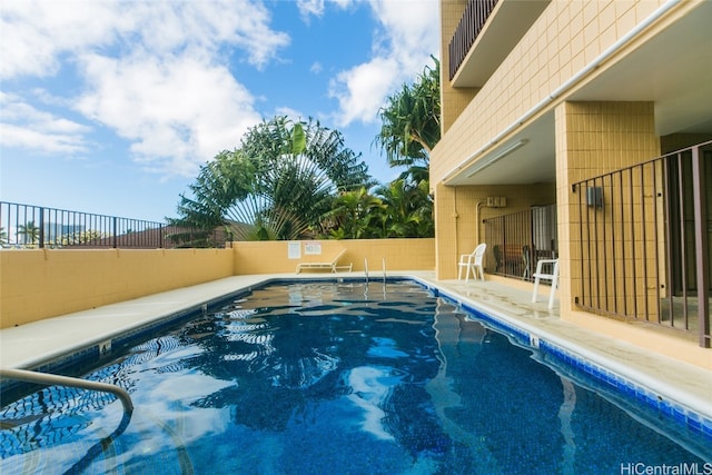 view of pool with a patio area