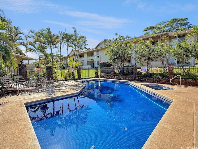 95-510 Wikao St Unit F201, Mililani, HI 96789 - view of swimming pool featuring a community hot tub and a patio