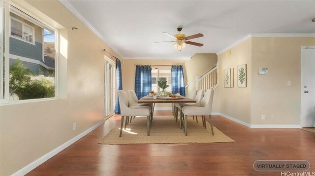 dining room with wood-type flooring, ceiling fan, and crown molding