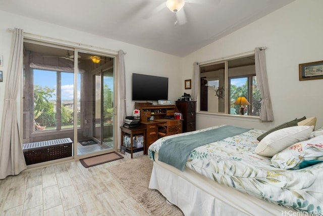 bedroom with lofted ceiling, access to exterior, wood-type flooring, and ceiling fan