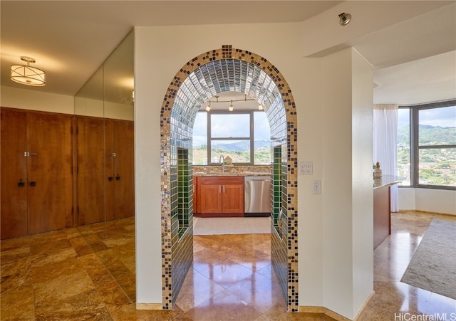 corridor with a mountain view and sink