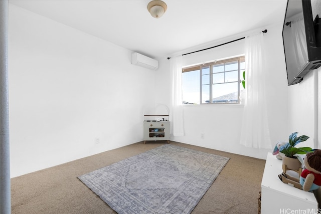 spare room featuring carpet and a wall mounted air conditioner