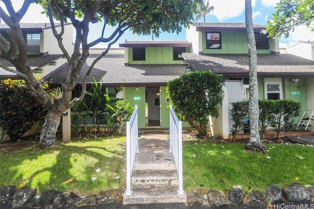 view of front of home with a front yard