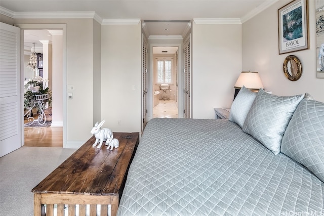 carpeted bedroom featuring ornamental molding