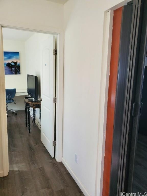 hall featuring dark hardwood / wood-style floors