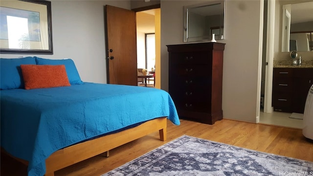 bedroom featuring light hardwood / wood-style flooring