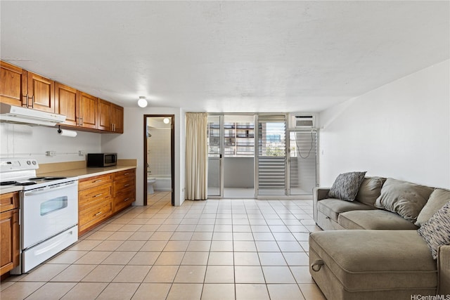 824 Kinau St Unit 712, Honolulu, HI 96813 - kitchen with white electric stove, brown cabinets, stainless steel microwave, open floor plan, and under cabinet range hood