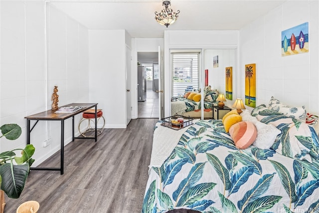 bedroom featuring hardwood / wood-style flooring