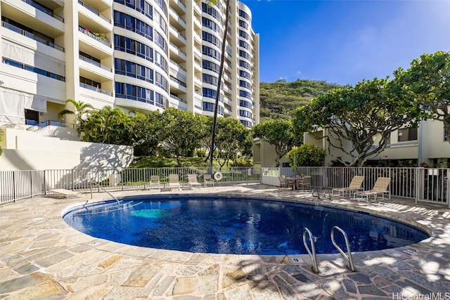 view of swimming pool featuring a patio