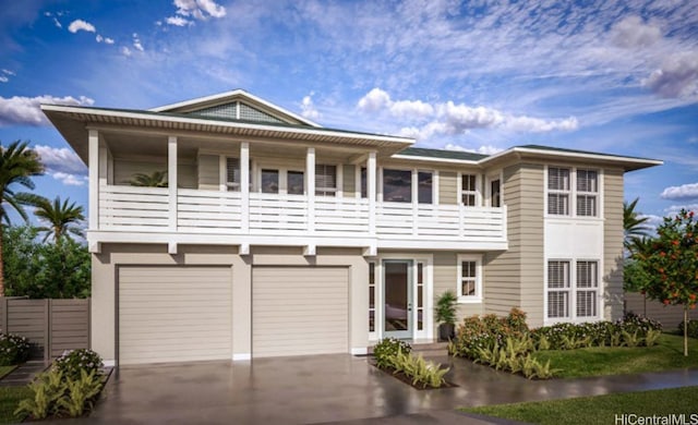 view of front of property with a balcony and a garage