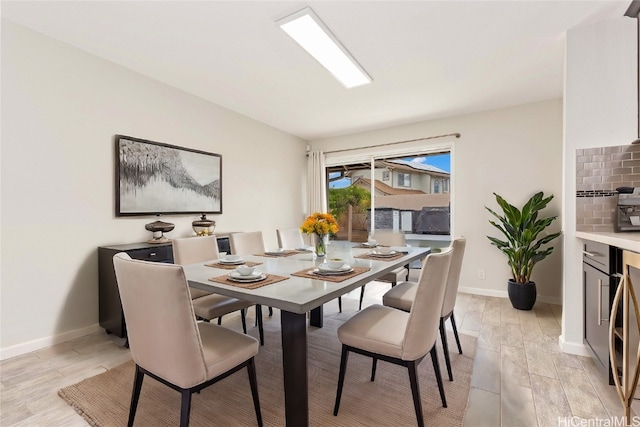 dining room featuring light hardwood / wood-style flooring