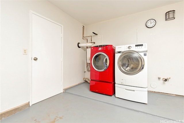 laundry room with washing machine and dryer