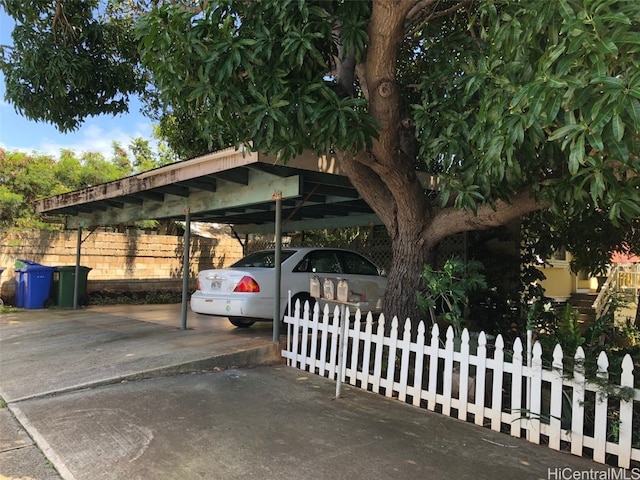 view of parking with a carport