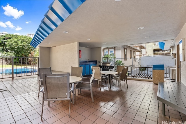 view of patio featuring a pool