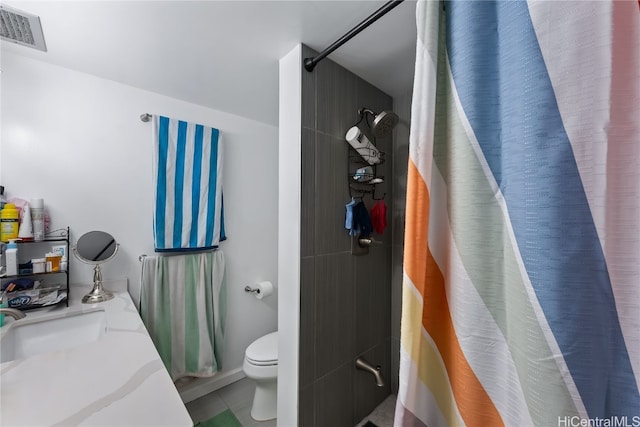 bathroom with sink, a shower with shower curtain, toilet, and tile patterned flooring