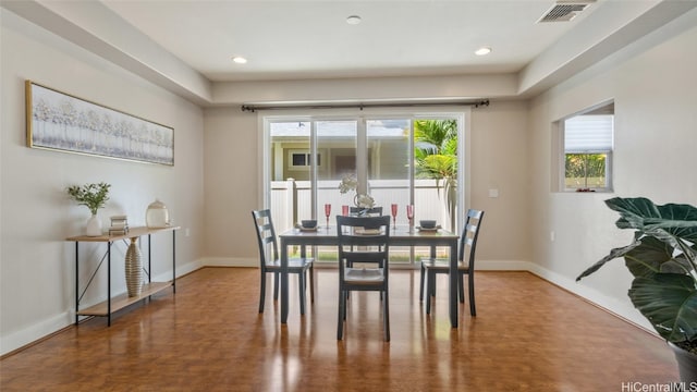 dining space featuring plenty of natural light