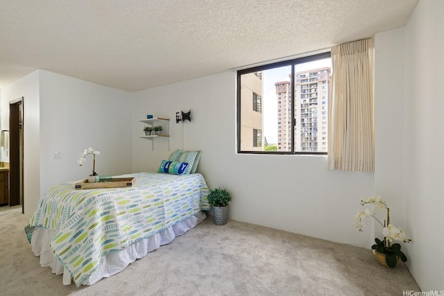 98-501 Koauka Loop Unit A603, Aiea, HI 96701 - bedroom featuring carpet floors and a textured ceiling