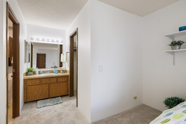 98-501 Koauka Loop Unit A603, Aiea, HI 96701 - bathroom featuring vanity, toilet, and a textured ceiling