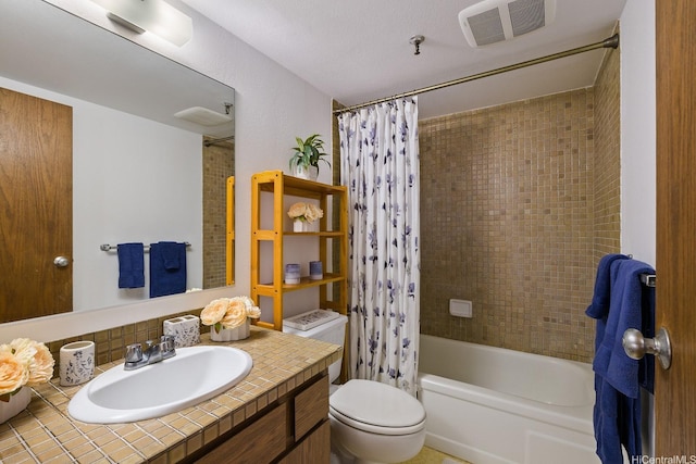 98-501 Koauka Loop Unit A603, Aiea, HI 96701 - bathroom featuring vanity, shower / bath combo, toilet, and tasteful backsplash