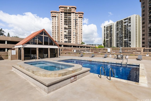 98-501 Koauka Loop Unit A603, Aiea, HI 96701 - community pool with a hot tub and a patio