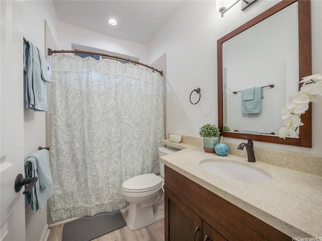 84-883 Maiola St Unit 118, Waianae, HI 96792 - bathroom with vanity, wood finished floors, and a shower with shower curtain