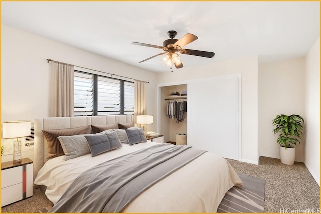 bedroom featuring carpet flooring, ceiling fan, and a closet