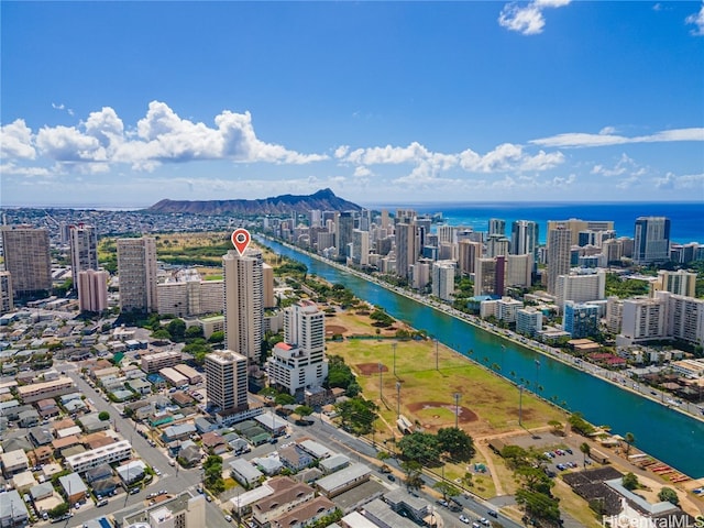 bird's eye view with a water and mountain view