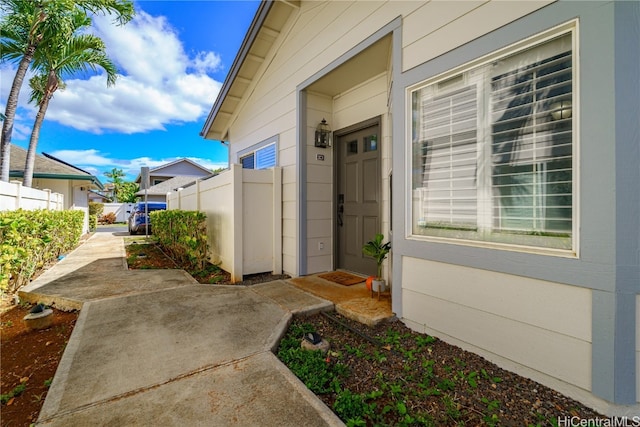 property entrance featuring a patio area