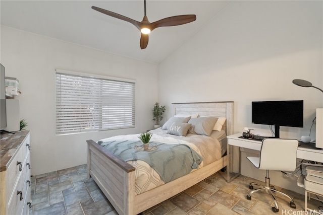 bedroom featuring lofted ceiling and ceiling fan