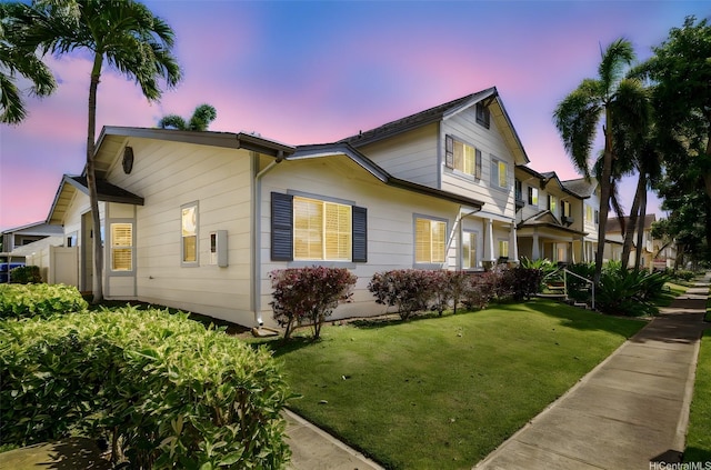 91-1061 Kaileolea Dr Unit 2C1, Ewa Beach, HI 96706 - view of front facade with a lawn