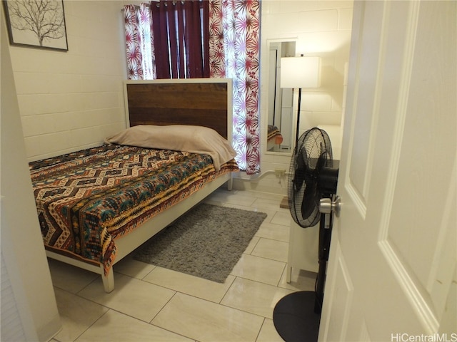 bedroom featuring light tile patterned floors