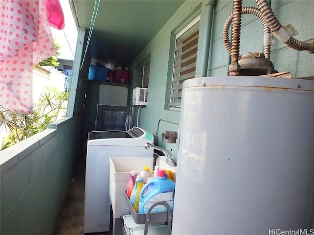 laundry area featuring water heater