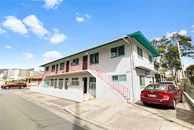 view of front facade with cooling unit