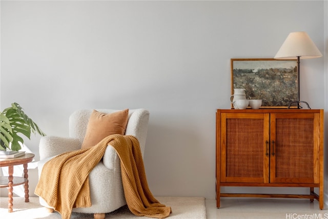 sitting room with light colored carpet