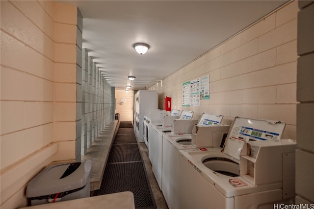 laundry area with separate washer and dryer