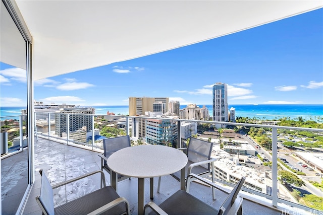 balcony featuring a water view