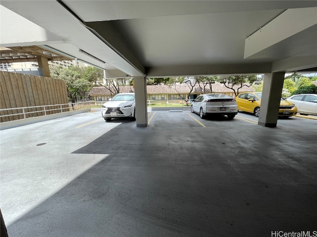 garage featuring a carport