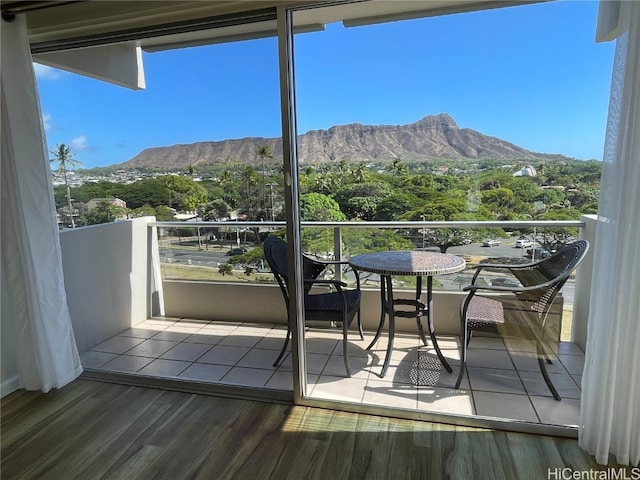 balcony featuring a mountain view