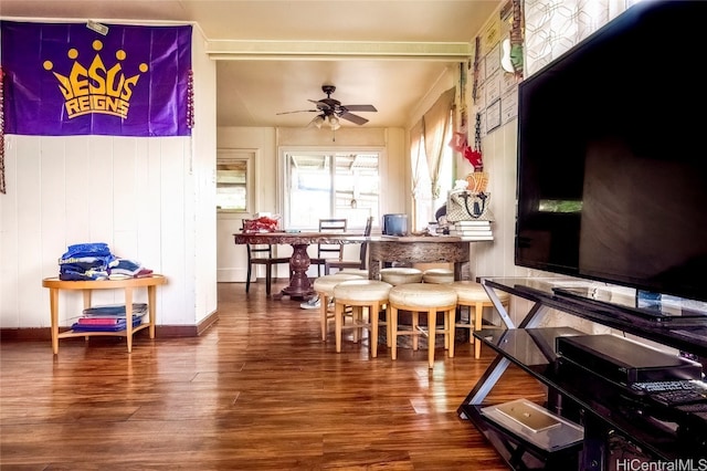 dining space featuring ceiling fan and hardwood / wood-style floors