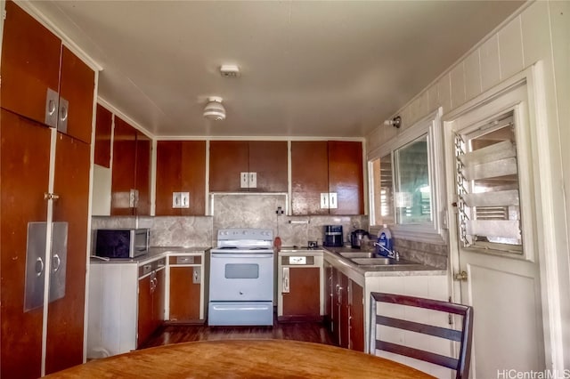 kitchen with sink and electric stove