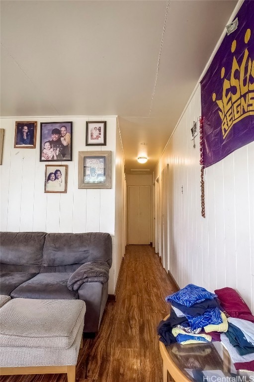 interior space featuring hardwood / wood-style flooring and wood walls