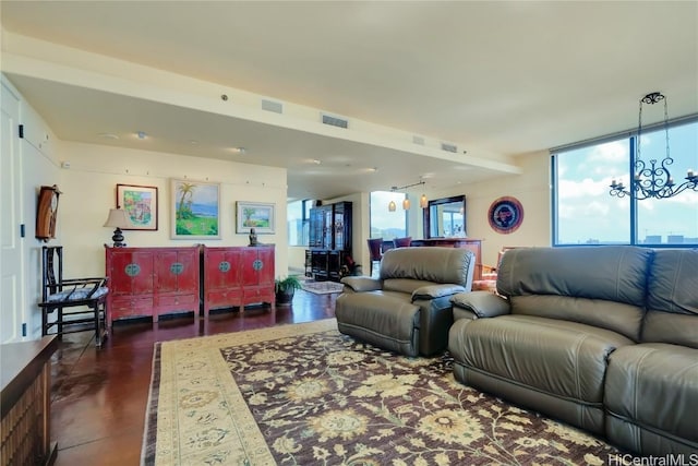 living room featuring a notable chandelier