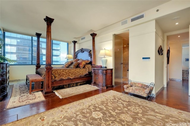 bedroom featuring dark wood-type flooring