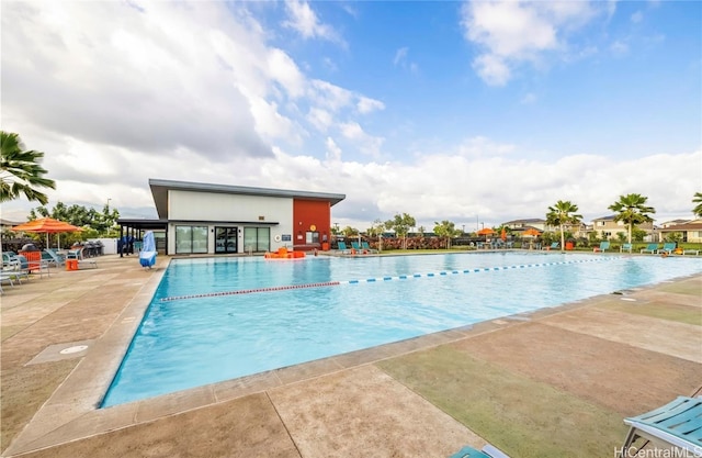 view of swimming pool featuring a patio