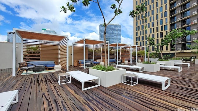 wooden deck featuring an outdoor living space