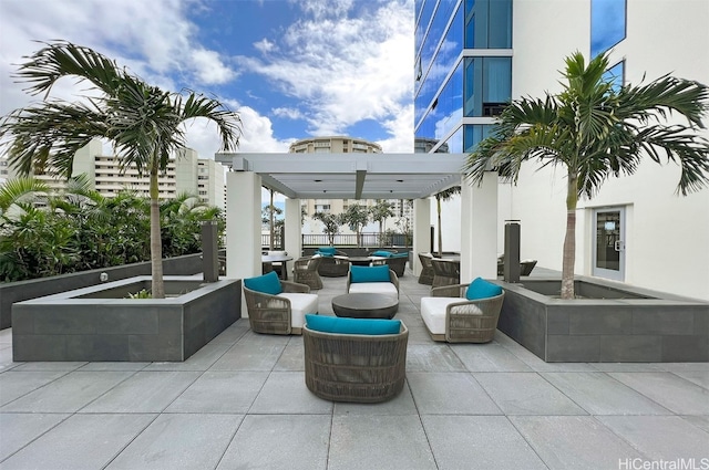 view of patio / terrace featuring a pergola and outdoor lounge area