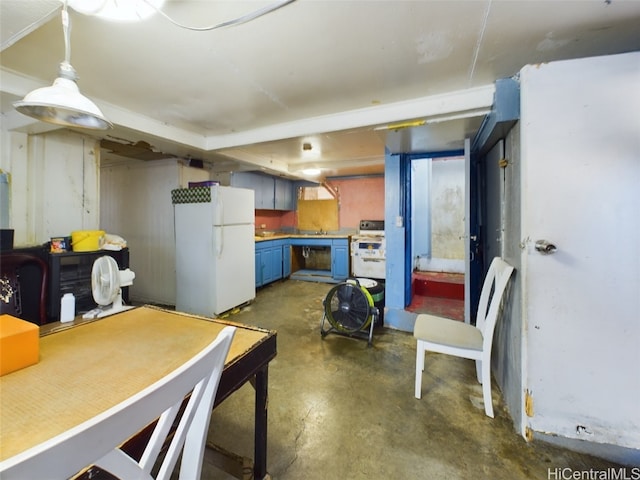 kitchen featuring white appliances and sink